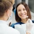 male-professional-dentist-with-gloves-mask-discuss-what-treatment-will-look-like-patient-s-teeth turkey zirconia veneers